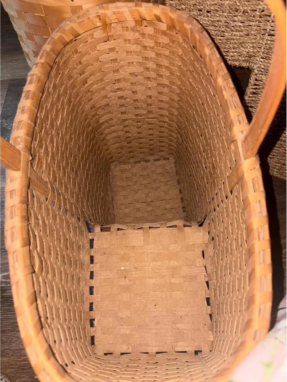 Woven reed stair-step storage basket.Vintage